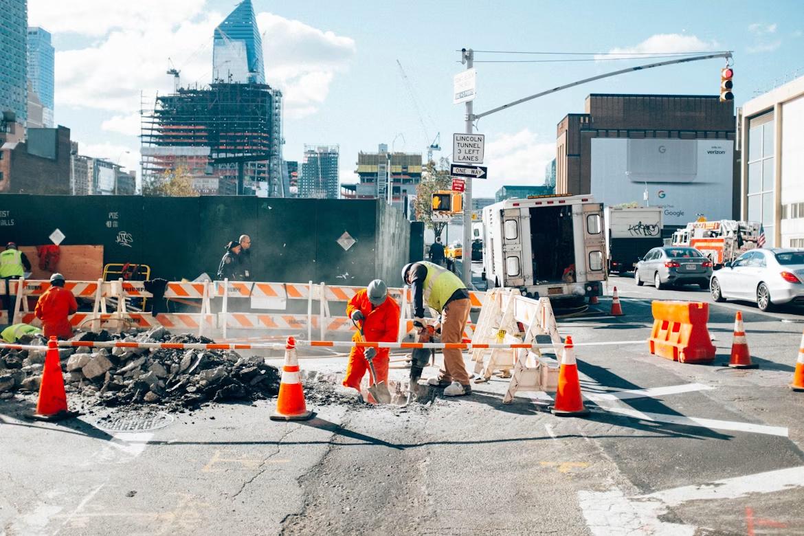 Crew breaking pavement on a New York City street